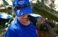 HSUS staff holding a dog during Hurricane Ian disaster response