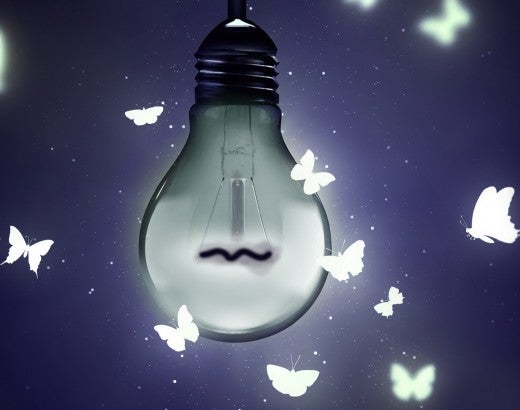Photo illustration of a dim light bulb with illustrated butterflies